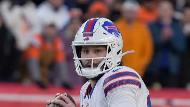 Buffalo Bills quarterback Josh Allen steps back before throwing his pass during second half action.