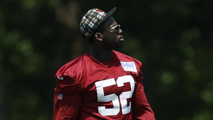 Jun 10, 2025; Ashburn, VA, USA; Washington Commanders defensive tackle Javon Kinlaw (52) stands on the field on day one of minicamp at Commanders Park. Mandatory Credit: Geoff Burke-Imagn Images