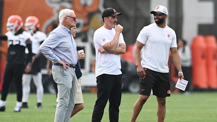 Jun 12, 2025; Berea, OH, USA; Cleveland Browns head coach Kevin Stefanski, middle, and managing and principal partner Dee Haslam, middle left, and managing and principal partner Jimmy Haslam, left, and executive vice president, football operations and general manager Andrew Berry watch practice during mini camp at CrossCountry Mortgage Campus. Mandatory Credit: Ken Blaze-Imagn Images