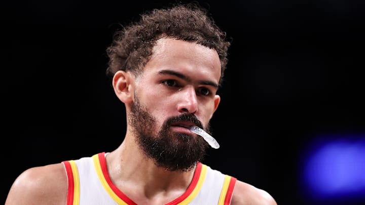 Trae Young # 11 of the Atlanta Hawks looks on against the Brooklyn Nets.