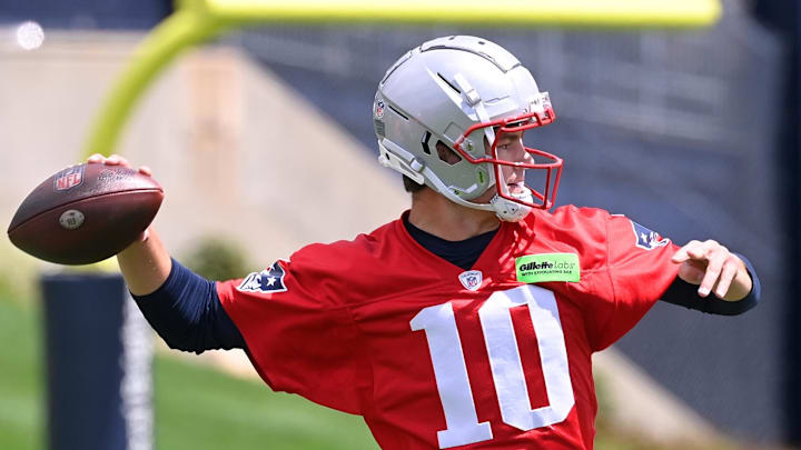May 11, 2024; Foxborough, MA, USA; New England Patriots quarterback Drake Maye (10) throws a pass at the New England Patriots rookie camp at Gillette Stadium.  Mandatory Credit: Eric Canha-USA TODAY Sports