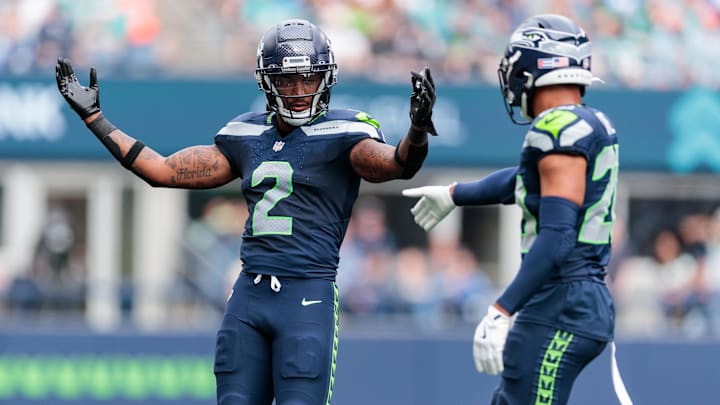 Sep 22, 2024; Seattle, Washington, USA; Seattle Seahawks safety Rayshawn Jenkins (2) celebrates during the second quarter against Miami Dolphins at Lumen Field. Mandatory Credit: Kevin Ng-Imagn Images