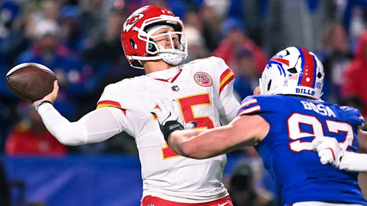 Nov 2, 2025; Orchard Park, New York, USA; Kansas City Chiefs quarterback Patrick Mahomes (15) throws a pass under pressure from Buffalo Bills defensive end Joey Bosa (97) in the fourth quarter at Highmark Stadium. Mandatory Credit: Mark Konezny-Imagn Images Nov 2, 2025; Orchard Park, New York, USA; Kansas City Chiefs quarterback Patrick Mahomes (15) throws a pass under pressure from Buffalo Bills defensive end Joey Bosa (97) in the fourth quarter at Highmark Stadium. Mandatory Credit: Mark Konezny-Imagn Images