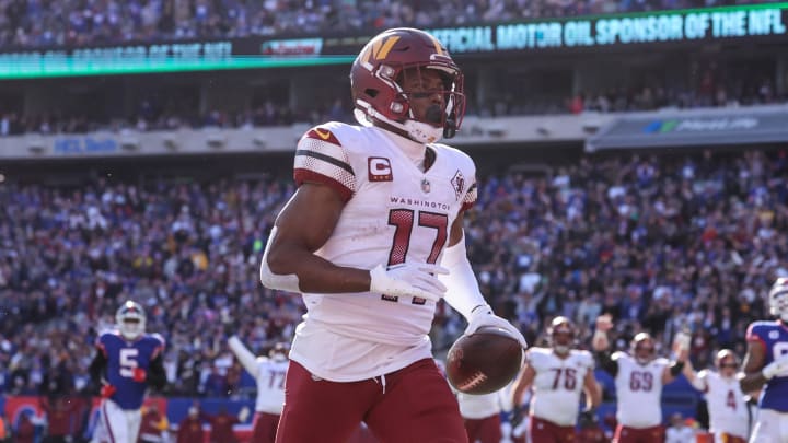 Dec 4, 2022; East Rutherford, New Jersey, USA; Washington Commanders wide receiver Terry McLaurin (17) score a receiving touchdown during the first half against the New York Giants at MetLife Stadium. Mandatory Credit: Vincent Carchietta-USA TODAY Sports