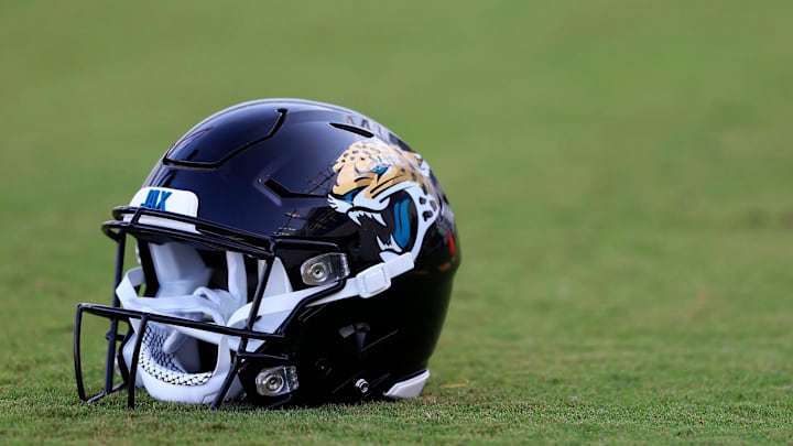 A Jacksonville Jaguars helmet lies on the turf Wednesday, July 26, 2023 at Miller Electric Center at EverBank Stadium in Jacksonville, Fla. Today marked the first day of training camp for the Jacksonville Jaguars.