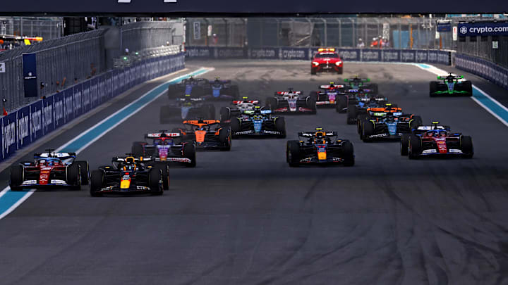 May 4, 2024; Miami Gardens, Florida, USA; Red Bull Racing driver Max Verstappen (1) leads the start of the F1 Sprint Race at Miami International Autodrome. Mandatory Credit: Peter Casey-Imagn Images
