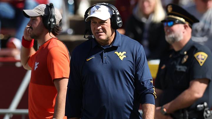 Oct 3, 2026; Ames, Iowa, USA;  West Virginia Mountaineers head coach Rich Rodriguez watches his team play the Iowa State Cyclones during the second half at Jack Trice Stadium.  Mandatory Credit: Reese Strickland-Imagn Images