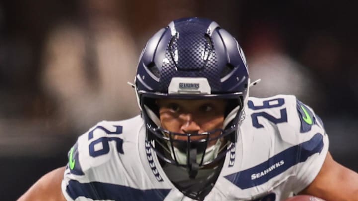 Seattle Seahawks running back Zach Charbonnet runs the ball against the Atlanta Falcons.