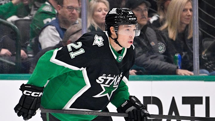 Dec 21, 2025; Dallas, Texas, USA; Dallas Stars left wing Jason Robertson (21) skates against the Toronto Maple Leafs during the game at the American Airlines Center. Mandatory Credit: Jerome Miron-Imagn Images