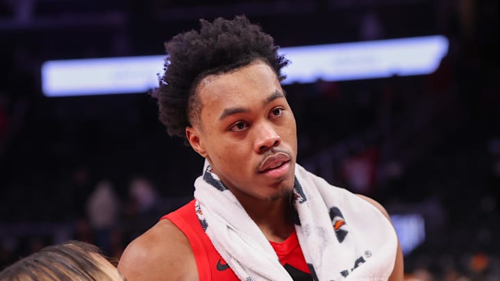 Toronto Raptors forward Scottie Barnes (4) does an interview after a victory over the Atlanta Hawks at State Farm Arena.