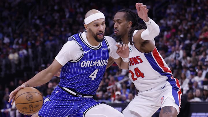 May 3, 2026; Detroit, Michigan, USA; Orlando Magic guard Jalen Suggs (4) dribbles defended by Detroit Pistons guard Daniss Jenkins (24) in the first half during game seven of the first round of the 2026 NBA Playoffs at Little Caesars Arena. Mandatory Credit: Rick Osentoski-Imagn Images