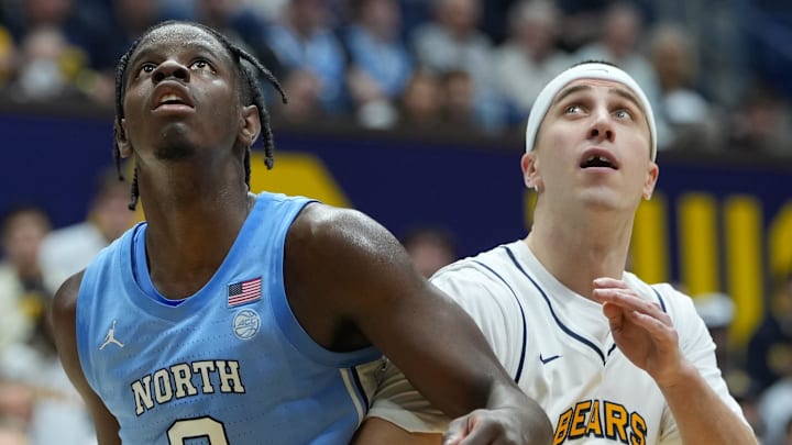 Jan 17, 2026; Berkeley, California, USA; North Carolina Tar Heels forward Caleb Wilson (8) blocks out California Golden Bears guard Nolan Dorsey (21) during the second half at Haas Pavilion. Mandatory Credit: Darren Yamashita-Imagn Images