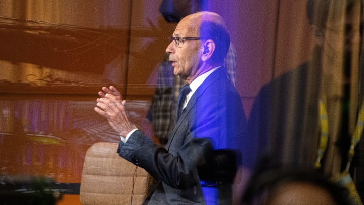 Paul Finebaum talks on a television set Paul Finebaum talks on a television set