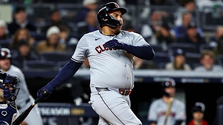 Oct 15, 2024; Bronx, New York, USA; Cleveland Guardians first base Josh Naylor (22) hits a single during the second inning against the New York Yankees in game two of the ALCS for the 2024 MLB Playoffs at Yankee Stadium. Mandatory Credit: Wendell Cruz-Imagn Images