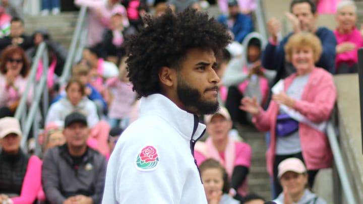 Oregon football quarterback Dante Moore speaks about his mother who had breast cancer during a rally for the Power of Pink Breast Cancer Awareness Walk at Autzen Stadium on Oct. 5, 2025.