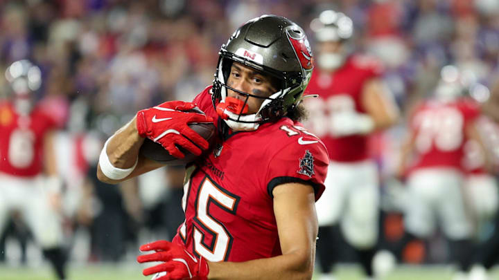 Oct 21, 2024; Tampa, Florida, USA; Tampa Bay Buccaneers wide receiver Jalen McMillan (15) is tackled by Baltimore Ravens safety Ar'Darius Washington (29) in the fourth quarter at Raymond James Stadium. Mandatory Credit: Nathan Ray Seebeck-Imagn Images Oct 21, 2024; Tampa, Florida, USA; Tampa Bay Buccaneers wide receiver Jalen McMillan (15) is tackled by Baltimore Ravens safety Ar'Darius Washington (29) in the fourth quarter at Raymond James Stadium. Mandatory Credit: Nathan Ray Seebeck-Imagn Images