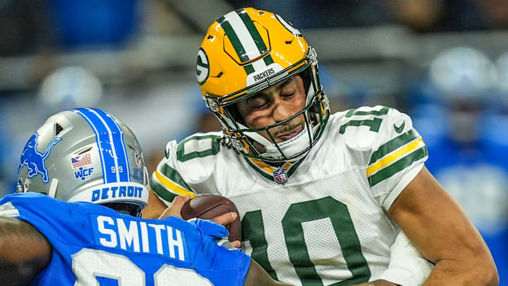 Green Bay Packers quarterback Jordan Love (10) is sacked by Detroit Lions defensive end Za'Darius Smith last season.