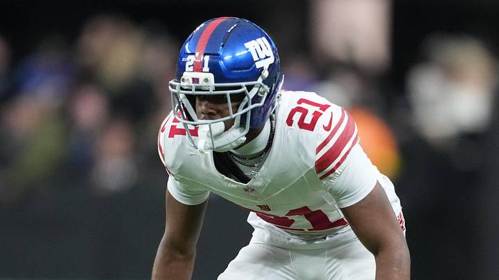 Dec 28, 2025; Paradise, Nevada, USA; New York Giants cornerback Paulson Adebo (21) looks on during the second half against the Las Vegas Raiders at Allegiant Stadium.  