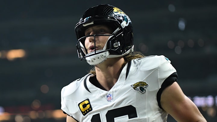 Dec 28, 2025; Indianapolis, Indiana, USA; Jacksonville Jaguars quarterback Trevor Lawrence (16) celebrates after a touchdown against the Indianapolis Colts during the first half at Lucas Oil Stadium. Mandatory Credit: Robert Goddin-Imagn Images