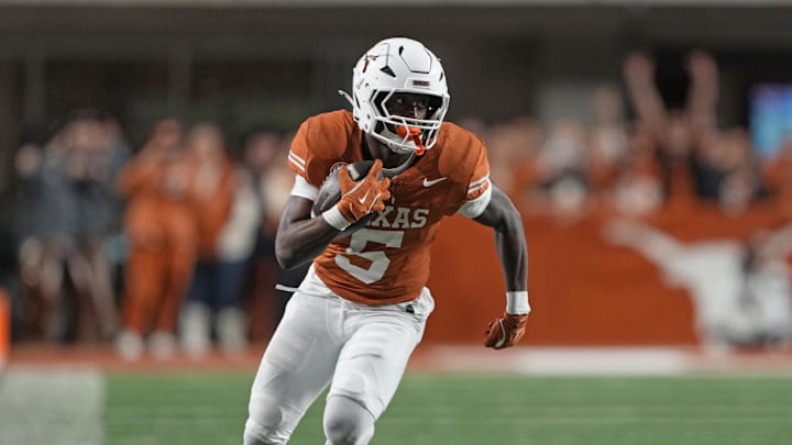 Texas Longhorns running back Quintrevion Wisner runs down the sideline during the first half against the Texas A&M Aggies at Darrell K Royal-Texas Memorial Stadium.