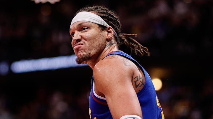Nov 7, 2025; Denver, Colorado, USA; Denver Nuggets forward Aaron Gordon (32) reacts after a play in the third quarter against the Golden State Warriors at Ball Arena. Mandatory Credit: Isaiah J. Downing-Imagn Images
