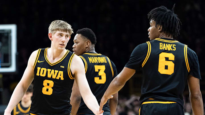 Iowa forward Cooper Koch (8) high-fives Iowa’s Tavion Banks (6) during a Big Ten basketball game against the Nebraska Cornhuskers Feb. 17, 2026 at Carver-Hawkeye Arena in Iowa City, Iowa.