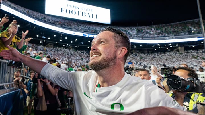 Oregon head coach Dan Lanning celebrates his win with Duck fans as the Oregon Ducks face the Penn State Nittany Lions on Sept. 27, 2025, at Beaver Stadium in University Park, Pennsylvania.