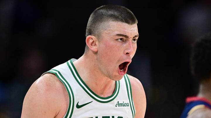 Nov 30, 2025; Cleveland, Ohio, USA; Boston Celtics guard Payton Pritchard (11) reacts after making a three point basket during the second half against the Cleveland Cavaliers at Rocket Arena. Mandatory Credit: David Dermer-Imagn Images