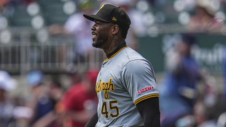 Jun 30, 2024; Cumberland, Georgia, USA; Pittsburgh Pirates relief pitcher Aroldis Chapman (45) reacts after defeating the Atlanta Braves at Truist Park. Mandatory Credit: Dale Zanine-Imagn Images