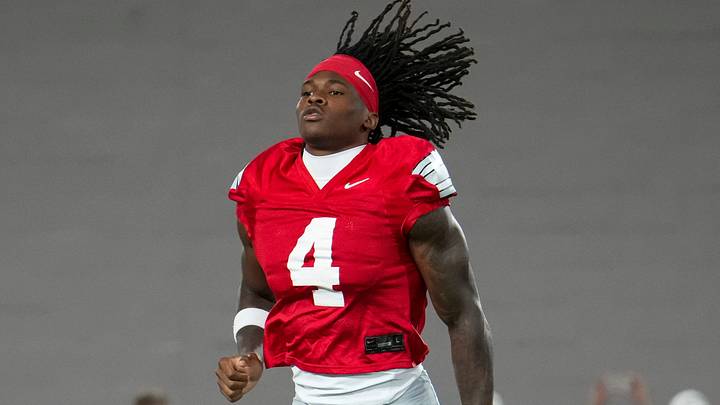 Ohio State Buckeyes wide receiver Jeremiah Smith (4) takes the field for football training camp inside the Woody Hayes Athletic Center in Columbus on Aug. 7, 2026. Ohio State Buckeyes wide receiver Jeremiah Smith (4) takes the field for football training camp inside the Woody Hayes Athletic Center in Columbus on Aug. 7, 2026.