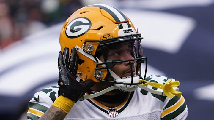 Green Bay Packers cornerback Jaire Alexander gestures to the fans before the game against the Chicago Bears at Soldier Field. Mandatory Credit: David Banks-Imagn Images
