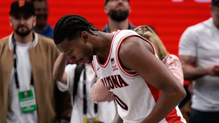 Mar 13, 2026; Kansas City, MO, USA; Arizona Wildcats guard Jaden Bradley (0) reacts at the end of the game against the Iowa State Cyclones at T-Mobile Center. Mandatory Credit: William Purnell-Imagn Images Mar 13, 2026; Kansas City, MO, USA; Arizona Wildcats guard Jaden Bradley (0) reacts at the end of the game against the Iowa State Cyclones at T-Mobile Center. Mandatory Credit: William Purnell-Imagn Images