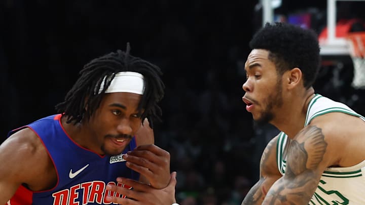 Detroit Pistons guard Jaden Ivey drives on Boston Celtics guard Anfernee Simons. Detroit Pistons guard Jaden Ivey drives on Boston Celtics guard Anfernee Simons.