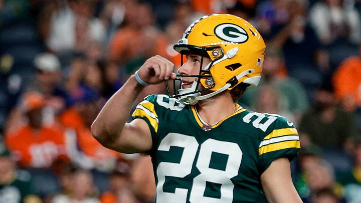 Green Bay Packers kicker Trey Smack kicks an extra point at Denver. Green Bay Packers kicker Trey Smack kicks an extra point at Denver.