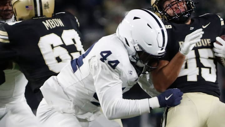 Penn State Nittany Lions defensive end Jaylen Harvey (44) tackles Purdue Boilermakers running back Devin Mockobee (45) Saturday, Nov. 16, 2024, during the NCAA football game at Ross-Ade Stadium in West Lafayette, Ind. Penn State Nittany Lions won 49-10.