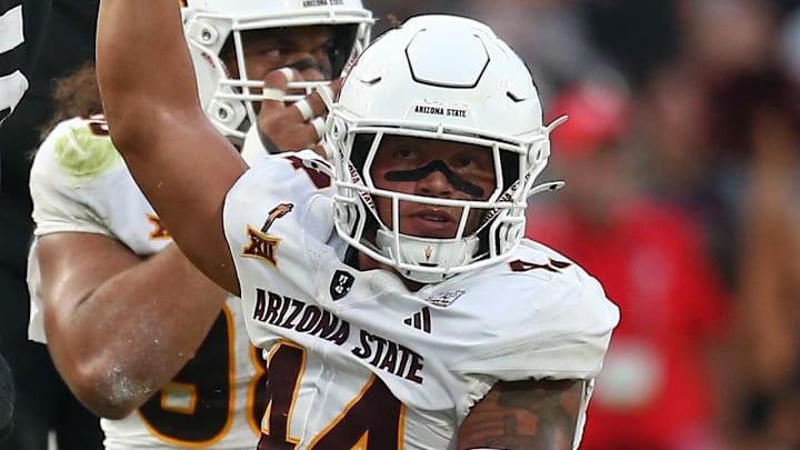 Sep 6, 2025; Starkville, Mississippi, USA; Arizona State Sun Devils linebacker Keyshaun Elliott (44) reacts after tackling Mississippi State Bulldogs quarterback Blake Shapen (2) during the first quarter at Davis Wade Stadium at Scott Field. Mandatory Credit: Petre Thomas-Imagn Images