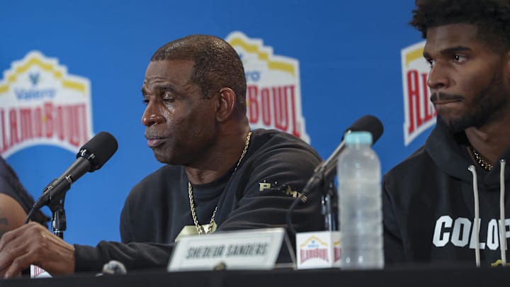 Colorado Buffaloes head coach Deion Sanders talks with the media after the game against the Brigham Young Cougars at Alamodome. Mandatory Credit: Troy Taormina-Imagn Images