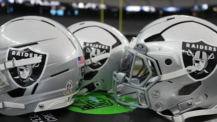 Nov 23, 2025; Paradise, Nevada, USA; Las Vegas Raiders helmets on the sidelines at Allegiant Stadium. Mandatory Credit: Kirby Lee-Imagn Images Nov 23, 2025; Paradise, Nevada, USA; Las Vegas Raiders helmets on the sidelines at Allegiant Stadium. Mandatory Credit: Kirby Lee-Imagn Images