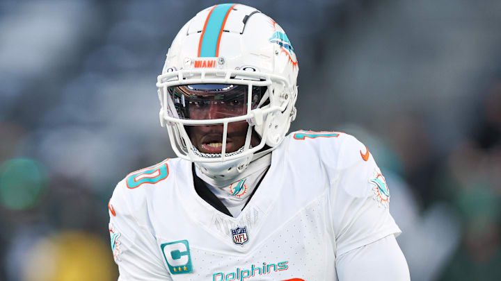 Jan 5, 2025; East Rutherford, New Jersey, USA; Miami Dolphins wide receiver Tyreek Hill (10) on the field before the game against the New York Jets at MetLife Stadium. Mandatory Credit: Vincent Carchietta-Imagn Images