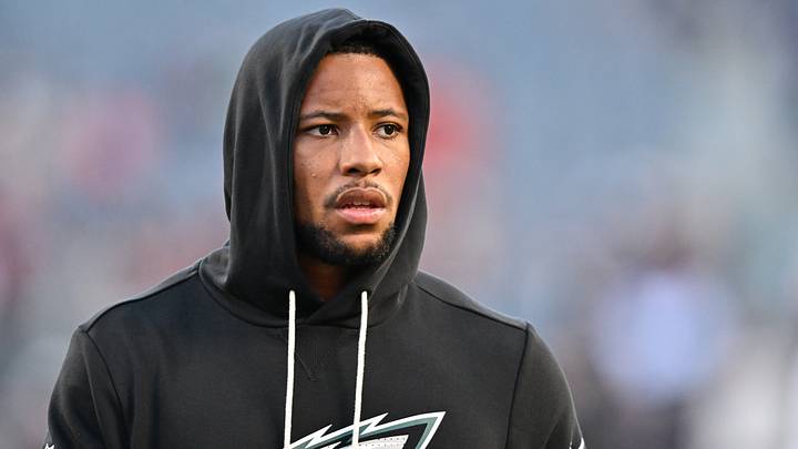 Philadelphia Eagles running back Saquon Barkley looks on before the game against the Chicago Bears at Soldier Field. Philadelphia Eagles running back Saquon Barkley looks on before the game against the Chicago Bears at Soldier Field.