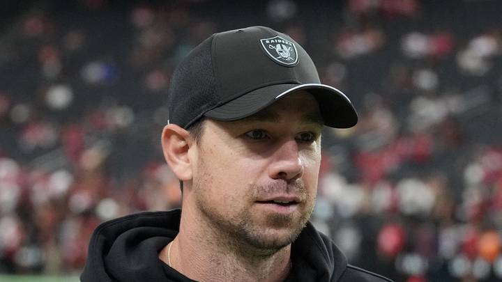 Las Vegas Raiders head coach Klint Kubiak looks on during warm-ups