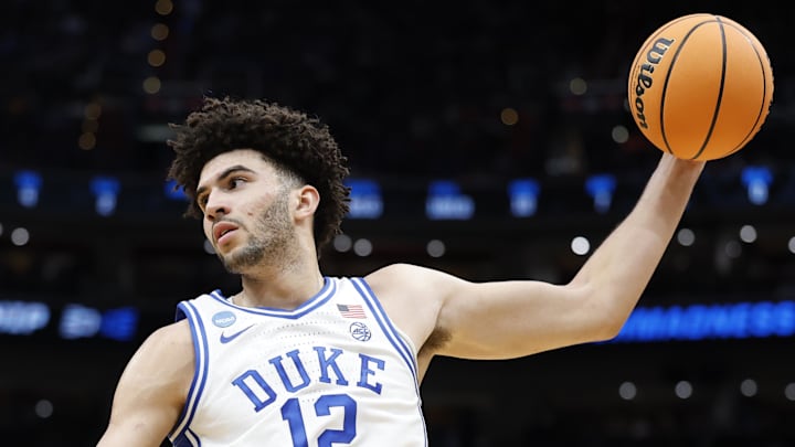 Duke Blue Devils forward Cameron Boozer works towards the basket against UConn.
