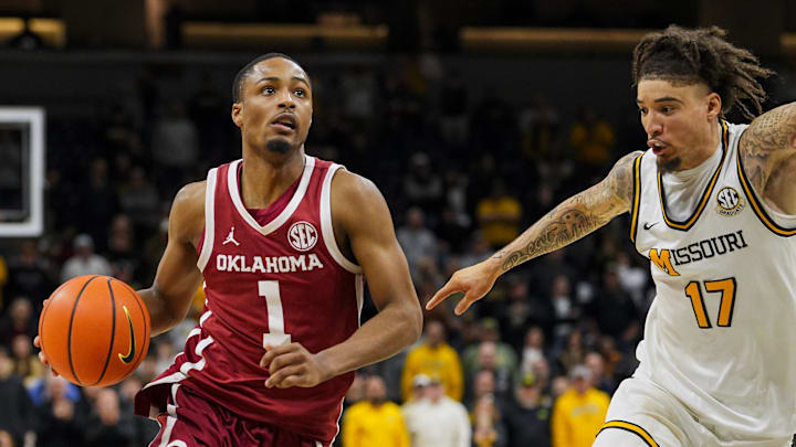 Oklahoma Sooners guard Xzayvier Brown (1) drives against Missouri Tigers guard Jayden Stone (17) during the second half at Mizzou Arena. Oklahoma Sooners guard Xzayvier Brown (1) drives against Missouri Tigers guard Jayden Stone (17) during the second half at Mizzou Arena.