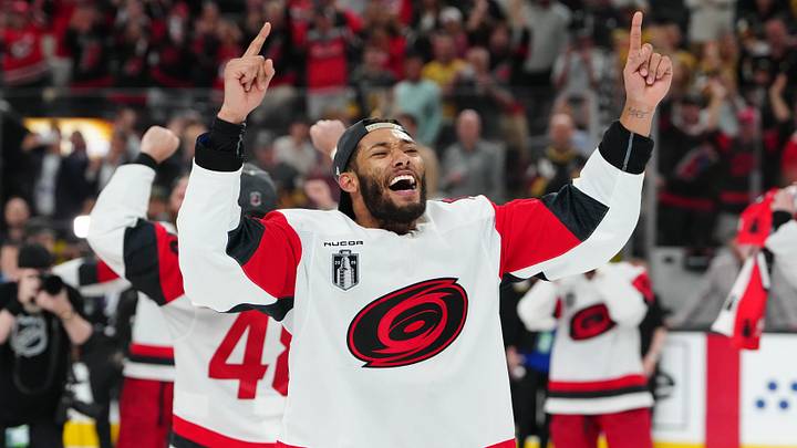 Jun 14, 2026; Las Vegas, Nevada, USA; Carolina Hurricanes defenseman K'andre Miller (19) celebrates the win against the Vegas Golden Knights in game six of the 2026 Stanley Cup Final at T-Mobile Arena. Mandatory Credit: Stephen R. Sylvanie-Imagn Images