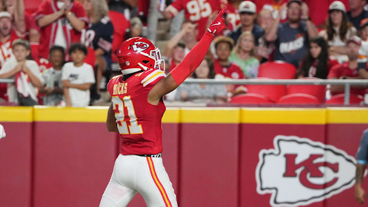 Aug 22, 2024; Kansas City, Missouri, USA; Kansas City Chiefs safety Jaden Hicks (21) celebrates against the Chicago Bears after recovering a fumble during the first half at GEHA Field at Arrowhead Stadium. Mandatory Credit: Denny Medley-Imagn Images Aug 22, 2024; Kansas City, Missouri, USA; Kansas City Chiefs safety Jaden Hicks (21) celebrates against the Chicago Bears after recovering a fumble during the first half at GEHA Field at Arrowhead Stadium. Mandatory Credit: Denny Medley-Imagn Images