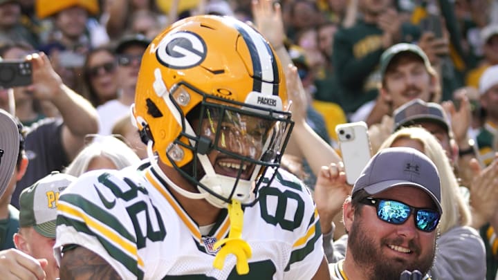 Green Bay Packers receiver Will Sheppard jumps into the crowd for a Lambeau Leap after scoring a touchdown in the preseason.
