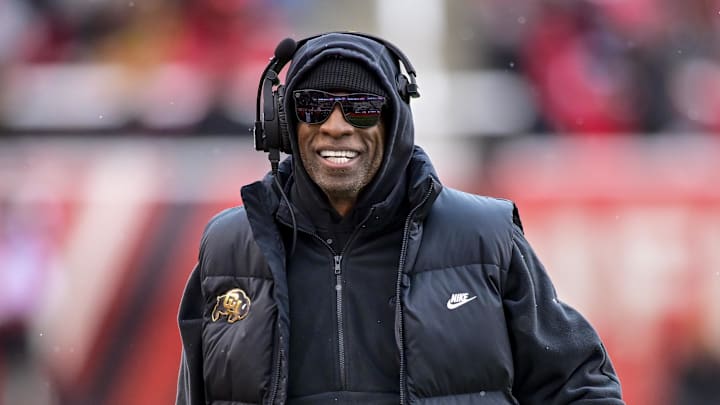 Nov 25, 2023; Salt Lake City, Utah, USA; Colorado Buffaloes head coach Deion 'Coach Prime' Sanders on the field against the Utah Utes at Rice-Eccles Stadium. Mandatory Credit: Christopher Creveling-Imagn Images