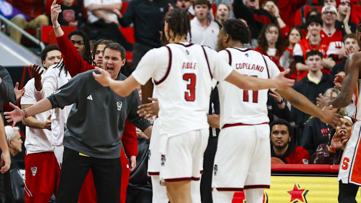 Jan 27, 2026; Raleigh, North Carolina, USA; NC State Wolfpack head coach Will Wade and bench react to the call during the second half of the game against the Syracuse Orange at Lenovo Center. Mandatory Credit: Jaylynn Nash-Imagn Images Jan 27, 2026; Raleigh, North Carolina, USA; NC State Wolfpack head coach Will Wade and bench react to the call during the second half of the game against the Syracuse Orange at Lenovo Center. Mandatory Credit: Jaylynn Nash-Imagn Images