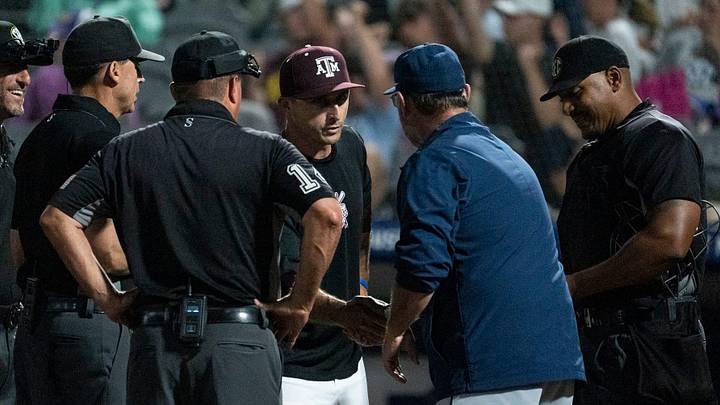 Texas A&M Aggies head coach Michael Earley and Auburn Tigers head coach Butch Thompson shake hands. Texas A&M Aggies head coach Michael Earley and Auburn Tigers head coach Butch Thompson shake hands.