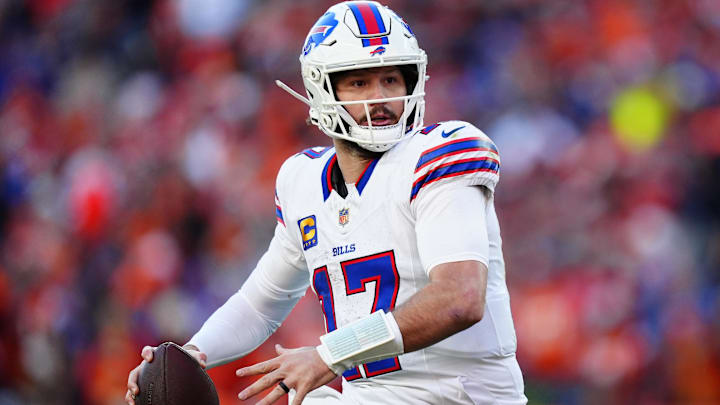 Buffalo Bills QB Josh Allen rolls out during the AFC Divisional Round playoff game against the Denver Broncos. Buffalo Bills QB Josh Allen rolls out during the AFC Divisional Round playoff game against the Denver Broncos.
